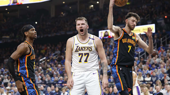 Apr 6, 2025; Oklahoma City, Oklahoma, USA; Los Angeles Lakers guard Luka Doncic (77) yells after scoring against the Oklahoma City Thunder during the second quarter at Paycom Center. Mandatory Credit: Alonzo Adams-Imagn Images Apr 6, 2025; Oklahoma City, Oklahoma, USA; Los Angeles Lakers guard Luka Doncic (77) yells after scoring against the Oklahoma City Thunder during the second quarter at Paycom Center. Mandatory Credit: Alonzo Adams-Imagn Images