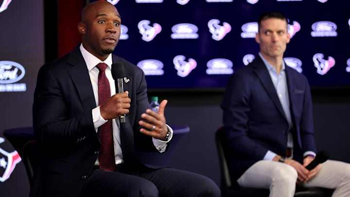 Houston Texans head coach Demeco Ryans speaks to the media during his introductory press conference as general manager Nick Caserio (right) looks on at NRG Stadium.