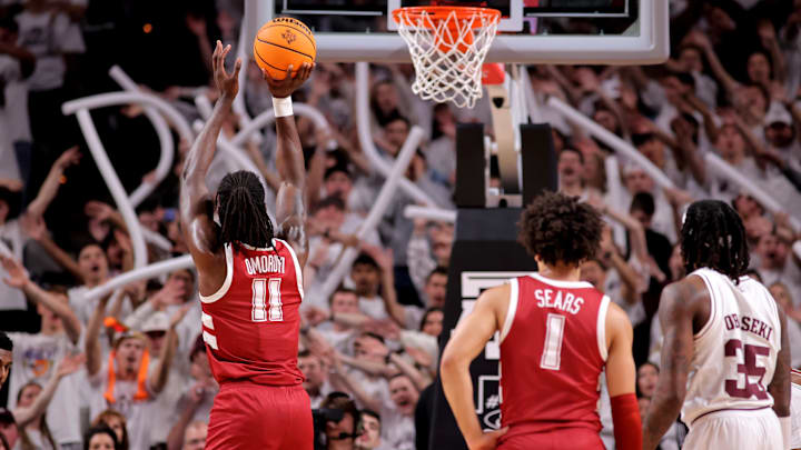 Jan 11, 2025; College Station, Texas, USA; Alabama Crimson Tide center Clifford Omoruyi (11) shoots a free throw against the Texas A&M Aggies during the first half at Reed Arena. Mandatory Credit: Erik Williams-Imagn Images
