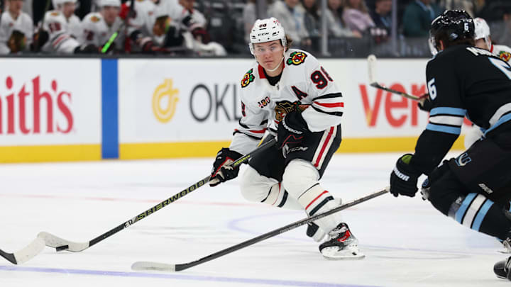 Mar 12, 2026; Salt Lake City, Utah, USA; Chicago Blackhawks center Connor Bedard (98) skates with the puck against the Utah Mammoth during the first period at Delta Center. Mandatory Credit: Rob Gray-Imagn Images