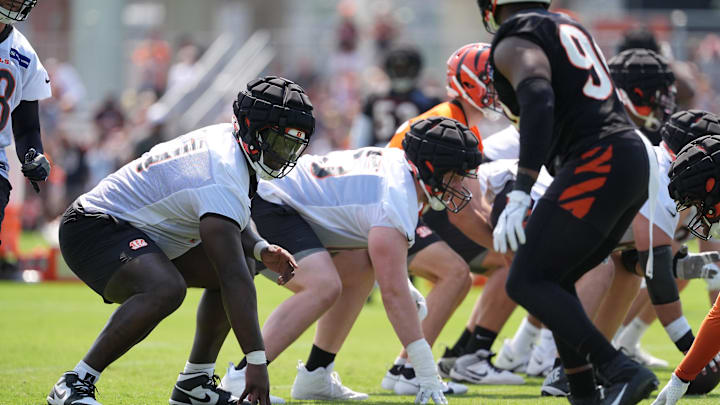 Jul 26, 2024; Cincinnati, OH, USA; Cincinnati Bengals offensive tackle Amarius Mims (71) lines up at right tackle during training camp practice at Kettering Health Practice Fields. Mandatory Credit: Kareem Elgazzar-Imagn Images Jul 26, 2024; Cincinnati, OH, USA; Cincinnati Bengals offensive tackle Amarius Mims (71) lines up at right tackle during training camp practice at Kettering Health Practice Fields. Mandatory Credit: Kareem Elgazzar-Imagn Images