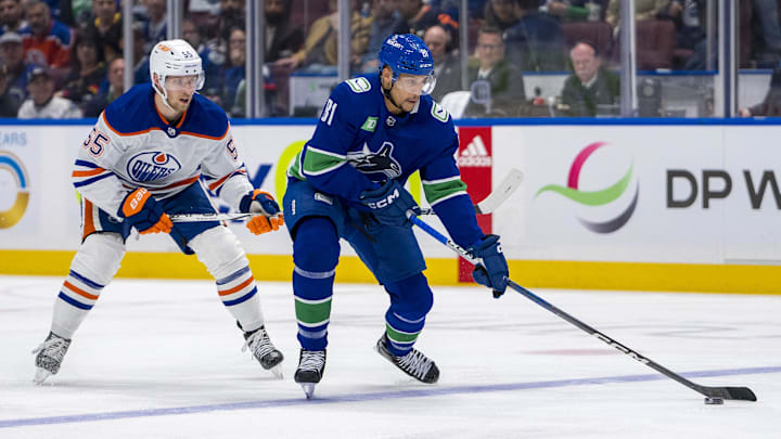 May 20, 2024; Vancouver, British Columbia, CAN; Edmonton Oilers forward Dylan Holloway (55) watches Vancouver Canucks forward Dakota Joshua (81) hanlde the puck during the first period in game seven of the second round of the 2024 Stanley Cup Playoffs at Rogers Arena. Mandatory Credit: Bob Frid-Imagn Images May 20, 2024; Vancouver, British Columbia, CAN; Edmonton Oilers forward Dylan Holloway (55) watches Vancouver Canucks forward Dakota Joshua (81) hanlde the puck during the first period in game seven of the second round of the 2024 Stanley Cup Playoffs at Rogers Arena. Mandatory Credit: Bob Frid-Imagn Images