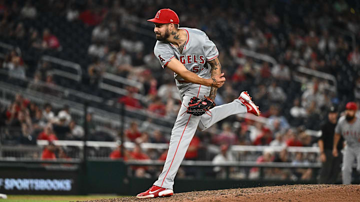 Aug 10, 2024; Washington, District of Columbia, USA;  Los Angeles Angels relief pitcher Hans Crouse (52) delivers a pitch during the ninth inning against the Washington Nationals at Nationals Park. Mandatory Credit: James A. Pittman-Imagn Images