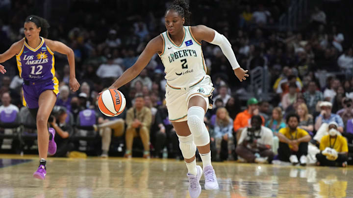 Aug 28, 2024; Los Angeles, California, USA; New York Liberty forward Kennedy Burke (2) dribbles the ball against the LA Sparks in the first half at Crypto.com Arena. Mandatory Credit: Kirby Lee-Imagn Images