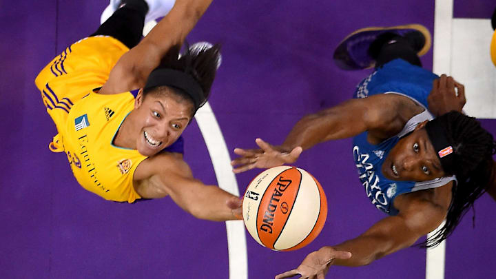 Oct 14, 2016; Los Angeles, CA, USA; Los Angeles Sparks forward Candace Parker (3) and Minnesota Lynx center Sylvia Fowles (34) reach for a rebound in the second quarter of game three of the WNBA Finals. at Staples Center. Mandatory Credit: Jayne Kamin-Oncea-Imagn Images