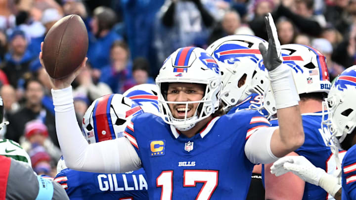 Dec 29, 2024; Orchard Park, New York, USA; Buffalo Bills quarterback Josh Allen (17) celebrates after scoring.