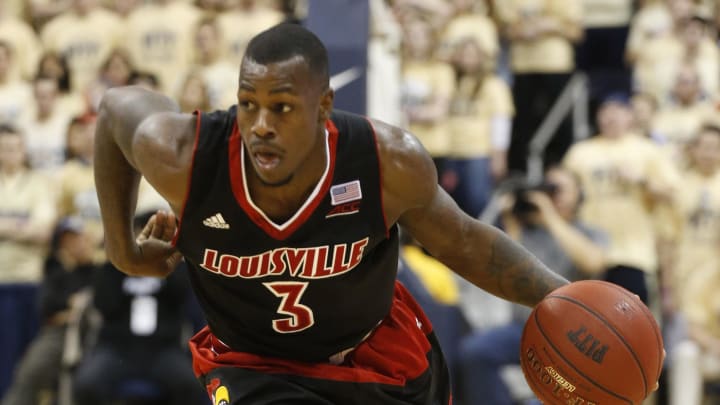 Jan 25, 2015; Pittsburgh, PA, USA; Louisville Cardinals guard Chris Jones (3) dribbles the ball against the Pittsburgh Panthers during the second half at the Petersen Events Center. Louisville won 80-68.