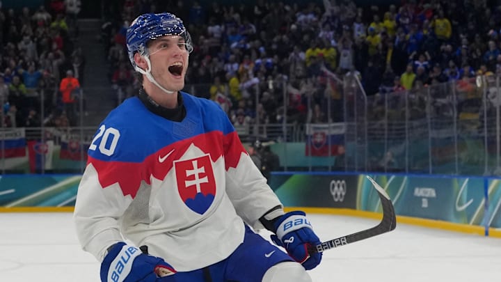 Feb 14, 2026; Milan, Italy; Juraj Slafkovsky of Slovakia reacts after the match during a Group B men's ice hockey game during the Milano Cortina 2026 Olympic Winter Games at Milano Santagiulia Ice Hockey Arena. Mandatory Credit: James Lang-Imagn Images
