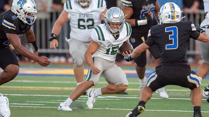De La Salle senior quarterback Jaxon Loftin answered all questions — literally and figuratively — in a Week 1 35-25 win at Serra. De La Salle senior quarterback Jaxon Loftin answered all questions — literally and figuratively — in a Week 1 35-25 win at Serra.