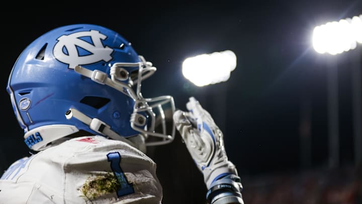 Nov 29, 2025; Raleigh, North Carolina, USA;  North Carolina Tar Heels wide receiver Jordan Shipp (1) celebrates a touchdown during the first half of the game against NC State Wolfpack at Carter-Finley Stadium.  Mandatory Credit: Jaylynn Nash-Imagn Images