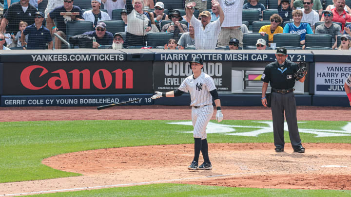 Jul 6, 2024; Bronx, New York, USA; New York Yankees first baseman Ben Rice (93) hits a three-run home run during the fifth inning against the Boston Red Sox at Yankee Stadium.