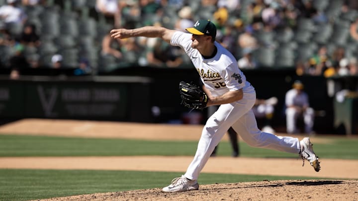 Sep 8, 2024; Oakland, California, USA; Oakland Athletics pitcher Ross Stripling (36) delivers a pitch against the Detroit Tigers during the eighth inning at Oakland-Alameda County Coliseum. Mandatory Credit: D. Ross Cameron-Imagn Images