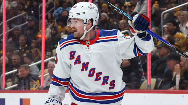 Jan 31, 2026; Pittsburgh, Pennsylvania, USA;  New York Rangers left wing Alexis Lafreniere (13) celebrates his power play goal against the Pittsburgh Penguins during the second period at PPG Paints Arena. Mandatory Credit: Charles LeClaire-Imagn Images