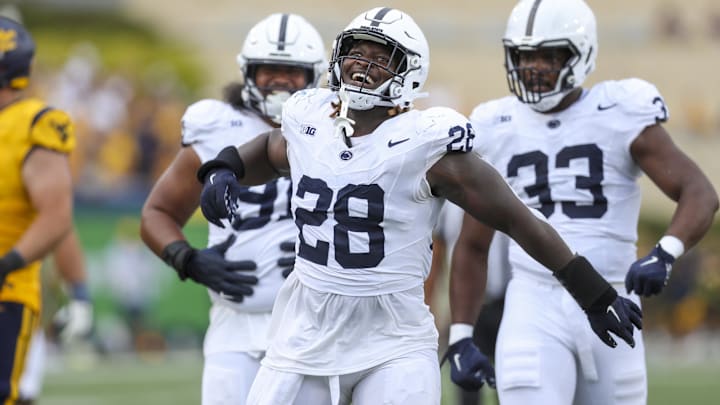 Aug 31, 2024; Morgantown, West Virginia, USA; Penn State Nittany Lions defensive tackle Zane Durant (28) celebrates after a stop during the third quarter against the West Virginia Mountaineers at Mountaineer Field at Milan Puskar Stadium. Mandatory Credit: Ben Queen-Imagn Images