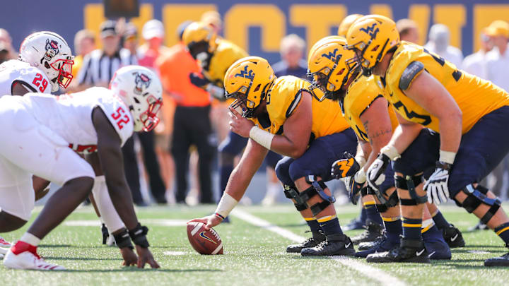West Virginia Mountaineers offensive lineman Briason Mays (68)