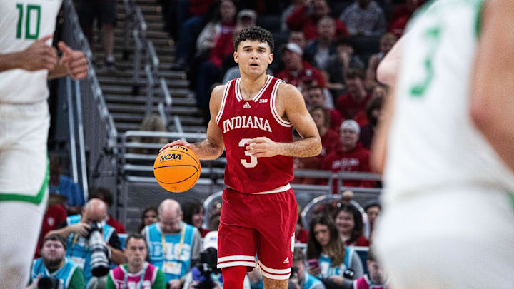 Mar 13, 2025; Indianapolis, IN, USA; Indiana Hoosiers guard Anthony Leal (3) dribbles the ball  in the first half against the Oregon Ducks at Gainbridge Fieldhouse. Mandatory Credit: Trevor Ruszkowski-Imagn Images