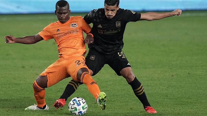 Oct 28, 2020; Los Angeles, CA, USA; Houston Dynamo midfielder Matias Vera (22) and LAFC defender