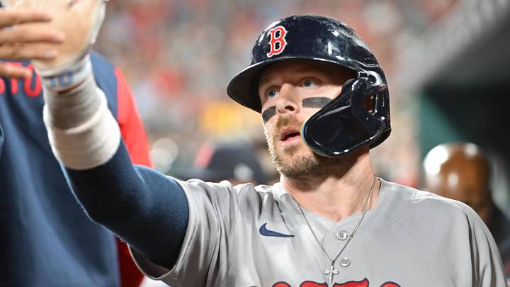 Apr 10, 2026; St. Louis, Missouri, USA; Boston Red Sox shortstop Trevor Story (10) is congratulated in the dugout after scoring in the fourth inning against the St. Louis Cardinals at Busch Stadium. Mandatory Credit: Tim Vizer-Imagn Images