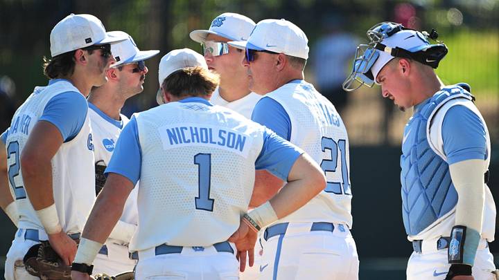 Jun 5, 2026; Chapel Hill, NC, USA;  North Carolina Tar Heels head coach Scott Forbes makes a visit to the mound in the seventh inning against the USC Trojans at Boshamer Stadium. Mandatory Credit: Zachary Taft-Imagn Images