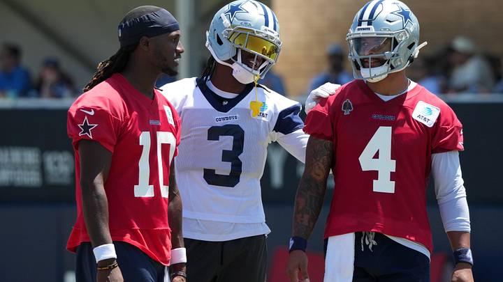 Dallas Cowboys quarterback Joe Milton III, receiver George Pickens, and quarterback Dak Prescott at training camp. Dallas Cowboys quarterback Joe Milton III, receiver George Pickens, and quarterback Dak Prescott at training camp.