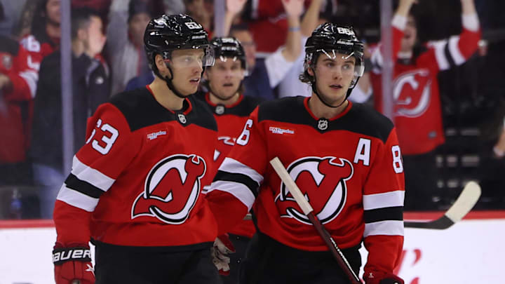 New Jersey Devils left wing Jesper Bratt (63) and center Jack Hughes (86). Mandatory Credit: Ed Mulholland-Imagn Images