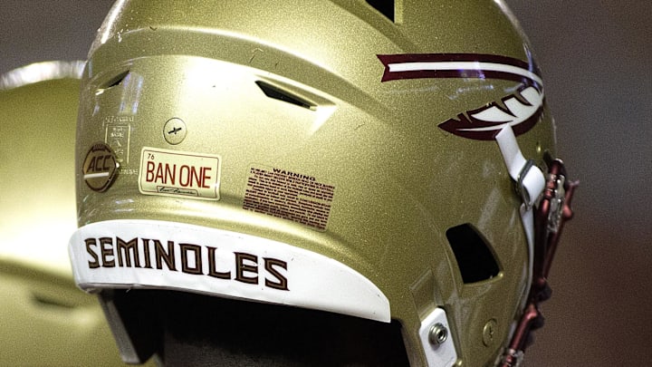 Sep 8, 2018; Tallahassee, FL, USA; Florida State Seminoles had a special sticker on their helmets to honor former FSU player Burt Reynolds who died this past week.  The Florida State Seminoles host the Samford Bulldogs at Doak Campbell Stadium. Florida State won 36-26. Mandatory Credit: Glenn Beil-Imagn Images