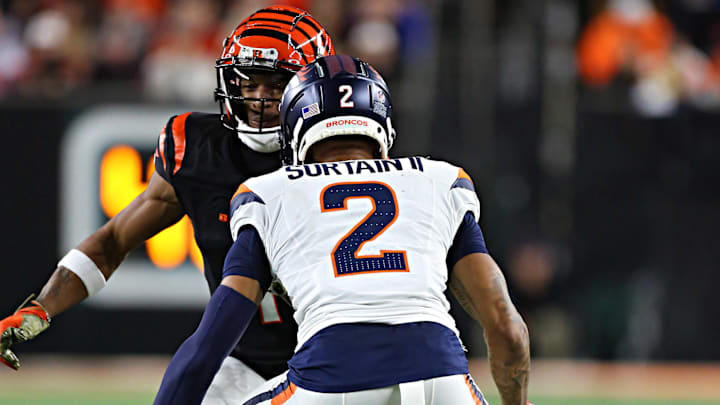 CINCINNATI, OH - DECEMBER 28 - Denver Broncos cornerback Pat Surtain II (2) covers Cincinnati Bengals wide receiver Ja'Marr Chase (1) in a game between the Denver Broncos and the Cincinnati Bengals at Paycor Stadium on Saturday, December 28, 2024. 
