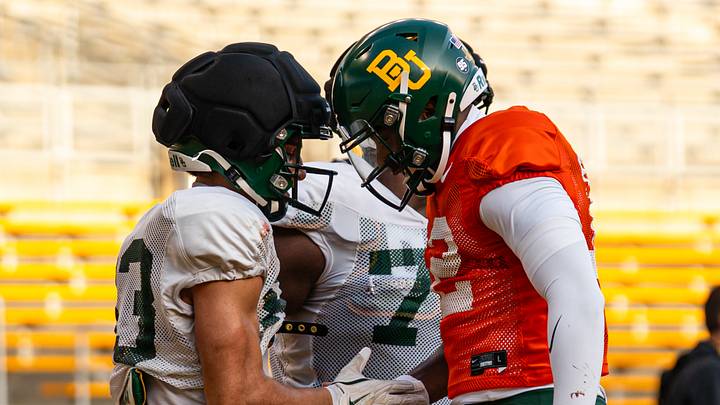 DJ Lagway and Jadon Porter celebrating a score in Spring Ball