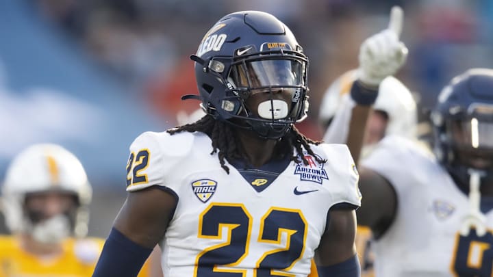 Dec 30, 2023; Tucson, AZ, USA; Toledo Rockets safety Emmanuel McNeil-Warren (22) against the Wyoming Cowboys in the Arizona Bowl at Arizona Stadium. Mandatory Credit: Mark J. Rebilas-USA TODAY Sports Dec 30, 2023; Tucson, AZ, USA; Toledo Rockets safety Emmanuel McNeil-Warren (22) against the Wyoming Cowboys in the Arizona Bowl at Arizona Stadium. Mandatory Credit: Mark J. Rebilas-USA TODAY Sports