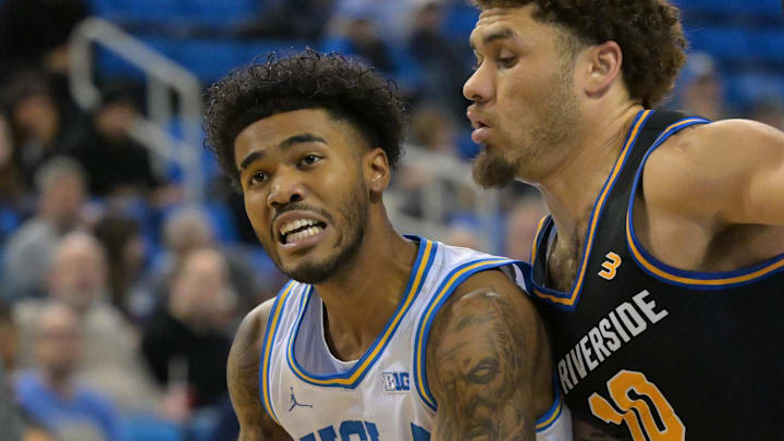 Dec 23, 2025; Los Angeles, California, USA; UCLA Bruins guard Skyy Clark (55) is defended by UC Riverside Highlanders guard Marqui Worthy Jr. (10) as he drives to the basket in the first half at Pauley Pavilion presented by Wescom Financial. Mandatory Credit: Jayne Kamin-Oncea-Imagn Images