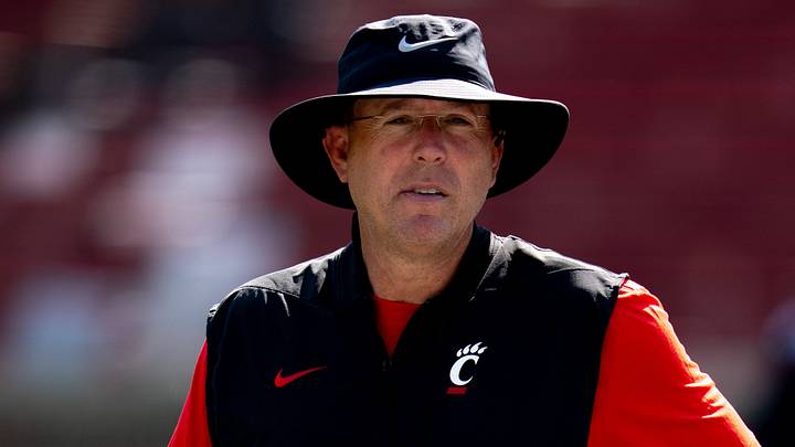 Cincinnati Bearcats head coach Scott Satterfield looks on during UC football training camp at Nippert Stadium in Cincinnati on Wednesday, Aug. 5, 2026. Cincinnati Bearcats head coach Scott Satterfield looks on during UC football training camp at Nippert Stadium in Cincinnati on Wednesday, Aug. 5, 2026.