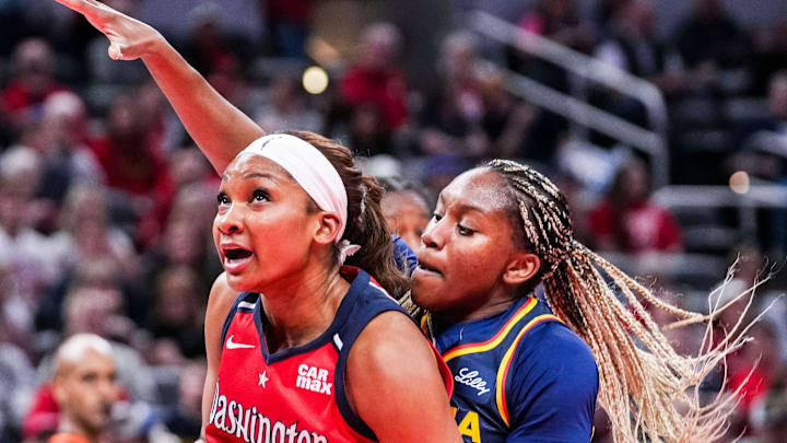 Indiana Fever Yvonne Ejim (15) guards Washington Mystics Kiki Iriafen (44) on Saturday, May 3, 2025, during a preseason game between the Indiana Fever and the Washington Mystics at Gainbridge Fieldhouse in Indianapolis. The Indiana Fever defeated the Washington Mystics in overtime, 79-74.