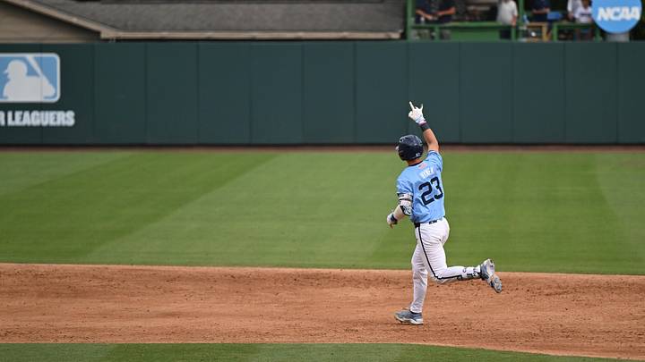 May 30, 2026; Chapel Hill, NC, USA; North Carolina Tar Heels catcher Colin Hynek (23) celebrates while running the bases during a home run during game 4 of the Chapel Hill Regional at Boshamer Stadium. Mandatory Credit: William Howard-Imagn Images