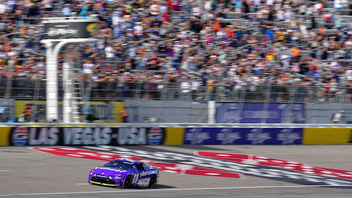 Mar 15, 2026; Las Vegas, Nevada, USA; Joe Gibbs Racing driver Denny Hamlin (11) crosses the line to win the Pennzoil 400 at Las Vegas Motor Speedway.