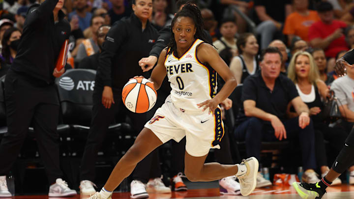 Jun 30, 2024; Phoenix, Arizona, USA; Indiana Fever guard Kelsey Mitchell (0) against the Phoenix Mercury during a WNBA game at Footprint Center. Mandatory Credit: Mark J. Rebilas-Imagn Images Jun 30, 2024; Phoenix, Arizona, USA; Indiana Fever guard Kelsey Mitchell (0) against the Phoenix Mercury during a WNBA game at Footprint Center. Mandatory Credit: Mark J. Rebilas-Imagn Images