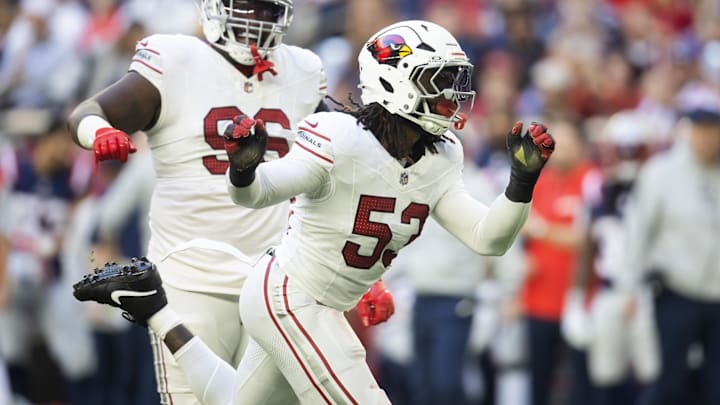 Dec 15, 2024; Glendale, Arizona, USA; Arizona Cardinals linebacker Baron Browning (53) celebrates a sack against the New England Patriots in the first half at State Farm Stadium. Mandatory Credit: Mark J. Rebilas-Imagn Images