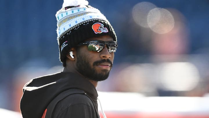 Cleveland Browns quarterback Shedeur Sanders (12) looks on during warm up prior to the game against the New England Patriots at Gillette Stadium.