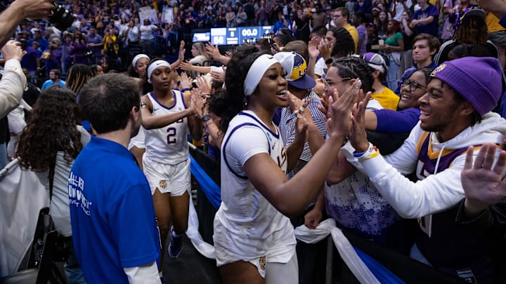 Mar 24, 2024; Baton Rouge, Louisiana, USA;  LSU Lady Tigers guard Aneesah Morrow (24) celebrates with fans after the game against the Middle Tennessee Blue Raiders at Pete Maravich Assembly Center. Mandatory Credit: Stephen Lew-Imagn Images