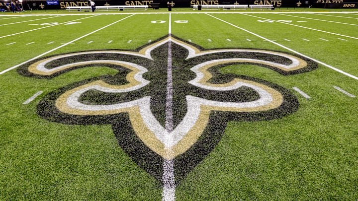 Oct 30, 2022; New Orleans, Louisiana, USA;  General view of the New Orleans Saints logo as the midfield logo fleur-de-lis after the game between the New Orleans Saints and the Las Vegas Raiders at Caesars Superdome. Mandatory Credit: Stephen Lew-Imagn Images