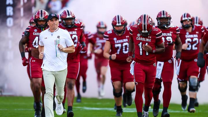 Nov 22, 2025; Columbia, South Carolina, USA; South Carolina Gamecocks head coach Shane Beamer leads his team onto the field before their game against the Coastal Carolina Chanticleers at Williams-Brice Stadium. Mandatory Credit: Jeff Blake-Imagn Images Nov 22, 2025; Columbia, South Carolina, USA; South Carolina Gamecocks head coach Shane Beamer leads his team onto the field before their game against the Coastal Carolina Chanticleers at Williams-Brice Stadium. Mandatory Credit: Jeff Blake-Imagn Images