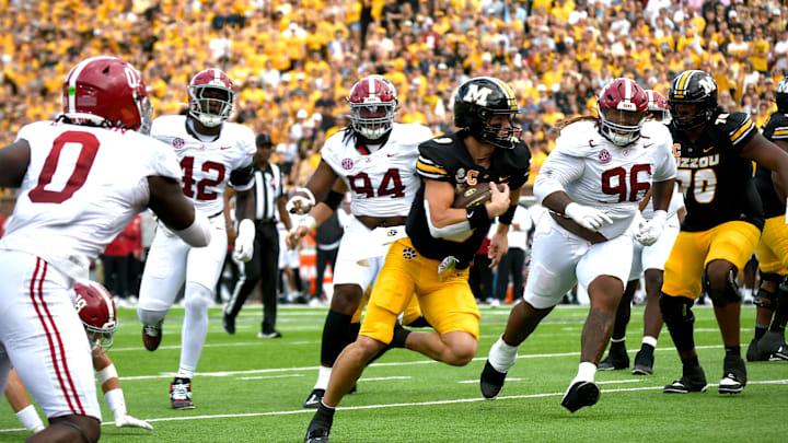 Oct 11, 2025; Columbia, MO, USA; Missouri Tigers quarterback Beau Pribula Simpson (9) rushes for a touchdown in the third quarter against the Alabama Crimson Tide at Faurot Field at Memorial Stadium. Oct 11, 2025; Columbia, MO, USA; Missouri Tigers quarterback Beau Pribula Simpson (9) rushes for a touchdown in the third quarter against the Alabama Crimson Tide at Faurot Field at Memorial Stadium.
