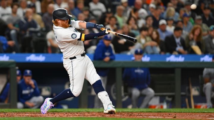 Seattle Mariners designated hitter Justin Turner hits a home run against the Texas Rangers on Sept. 12 at T-Mobile Park.