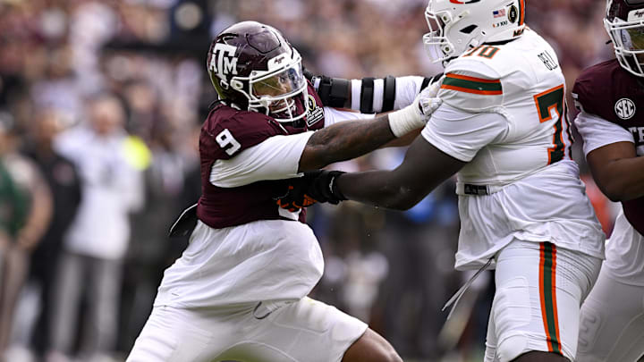 Dec 20, 2025; College Station, TX, USA; Miami Hurricanes offensive lineman Markel Bell (70) blocks Texas A&M Aggies defensive end Cashius Howell (9) during the game between the Aggies and the Hurricanes at Kyle Field. Mandatory Credit: Jerome Miron-Imagn Images