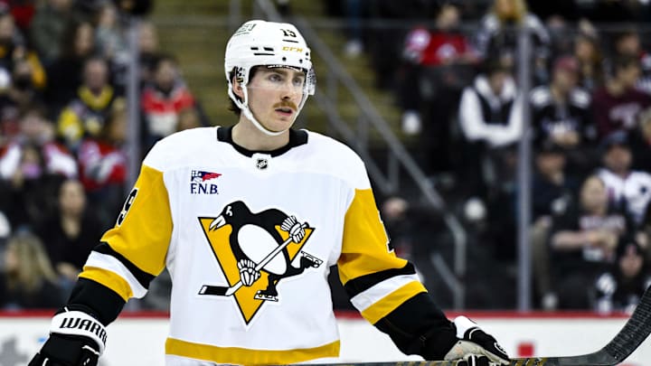 Apr 11, 2025; Newark, New Jersey, USA; Pittsburgh Penguins center Connor Dewar (19) during the second period against the New Jersey Devils at Prudential Center. Mandatory Credit: John Jones-Imagn Images