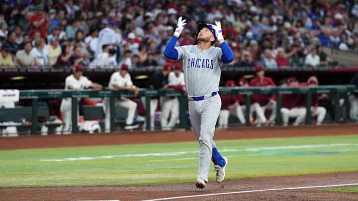 Apr 15, 2024; Phoenix, Arizona, USA; Chicago Cubs first baseman Michael Busch celebrates after