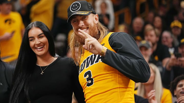 Former Iowa tight end George Kittle with his wife Claire Kittle, a former Iowa basketball player, during a second-round women's NCAA Tournament game between Iowa and West Virginia. Former Iowa tight end George Kittle with his wife Claire Kittle, a former Iowa basketball player, during a second-round women's NCAA Tournament game between Iowa and West Virginia.