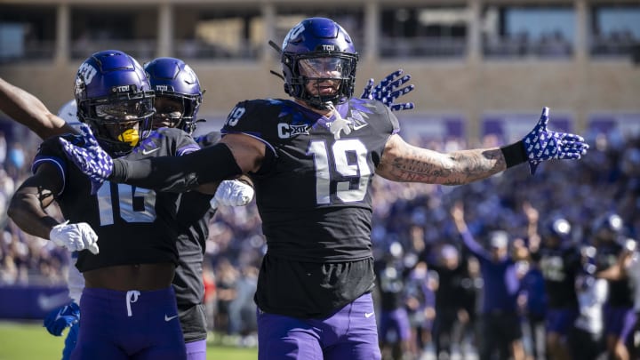 Oct 14, 2023; Fort Worth, Texas, USA; TCU Horned Frogs tight end Jared Wiley (19) and wide receiver Dylan Wright (16) celebrate after Wiley scores a touchdown against the Brigham Young Cougars during the game at Amon G. Carter Stadium. Mandatory Credit: Jerome Miron-USA TODAY Sports