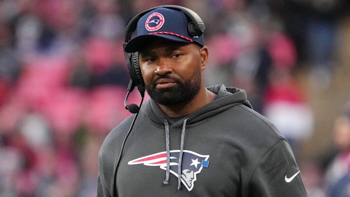 Oct 20, 2024; London, United Kingdom; New England Patriots coach Jerod Mayo watches from the sidelines against the New England Patriots in the second half of an NFL International Series game at Wembley Stadium. Mandatory Credit: Kirby Lee-Imagn Images
