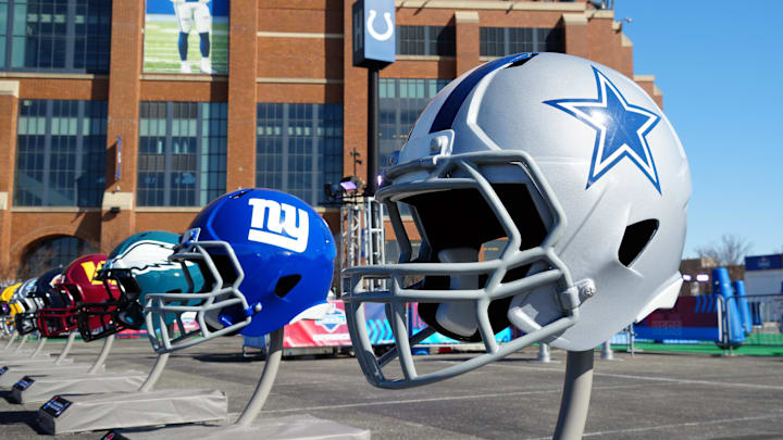 Feb 28, 2024; Indianapolis, IN, USA; A general view of large Dallas Cowboys and New York Giants helmets at the NFL Scouting Combine Experience at Lucas Oil Stadium. Mandatory Credit: Kirby Lee-Imagn Images