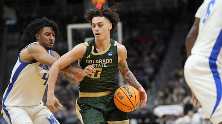 Colorado State Rams guard Kyan Evans (0).
